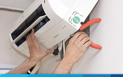 What is involved in servicing an Air Conditioner?